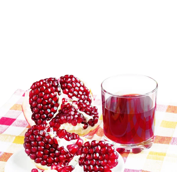 Sumo de romã e uma fruta de romã — Fotografia de Stock