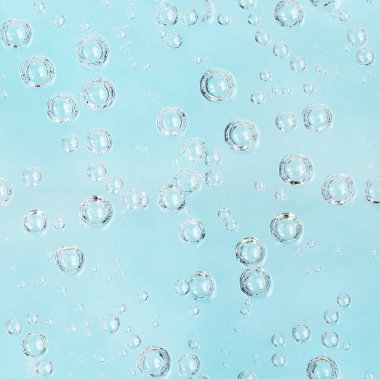 Soda kabarcıkları ile mavi arka plan