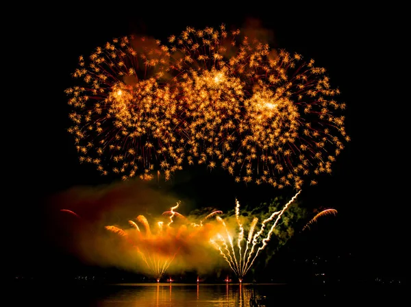 Fireworks fired over the water surface