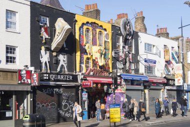 London, United Kingdom - October 9, 2018; Colorful, artistic facades of a street in Camden Town, close to Camden martket, famous for the market and alternative shops clipart