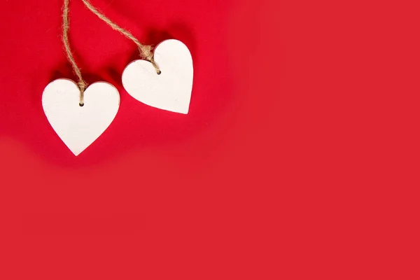 Two white hearts on a red background with copy space — Stock Photo, Image