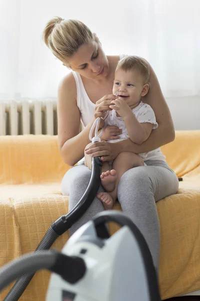 Mother Cleaning Babies Nose Nasal Aspiration Connected Vaccum Cleaner — Stock Photo, Image