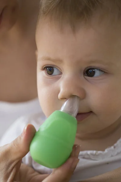 Mother Cleaning Babies Nose Vacuum Pump — Stock Photo, Image