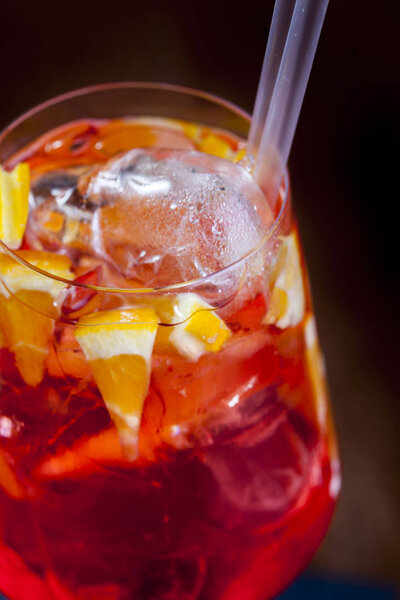 delicious alcohol aperol cocktail in wineglass, closeup