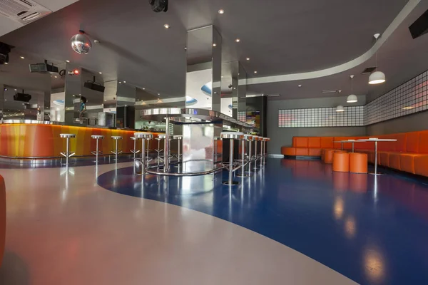 orange futuristic disco bar interior