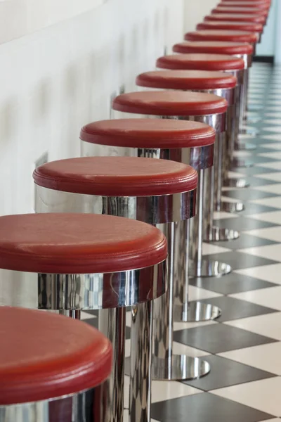 bar stool details in american diner restaurant, shallow DOPF
