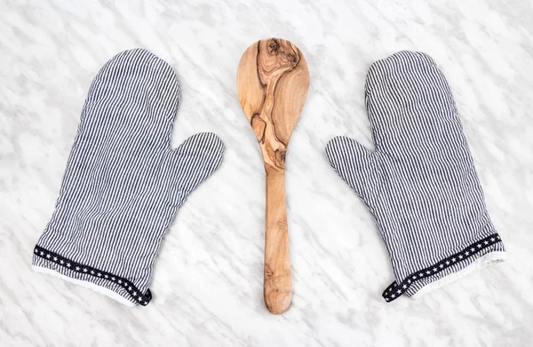 Wooden Spoon Striped Kitchen Gloves Marble Countertop — Stock Photo, Image
