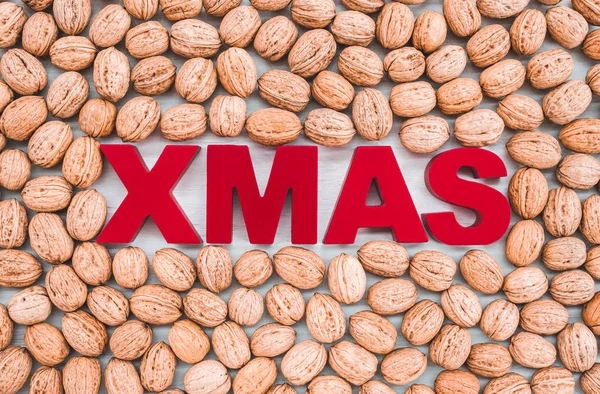 Christmas Theme Walnuts Surrounding Word Xmas Written Red Letters — Stock Photo, Image