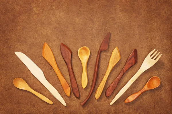 Handcrafted Wooden Utensils Brown Leather Background Fork Spoons Knives — Stock Photo, Image