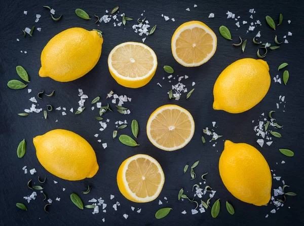 Fresh Lemons Sea Salt Herbs Dark Slate Background — Stock Photo, Image