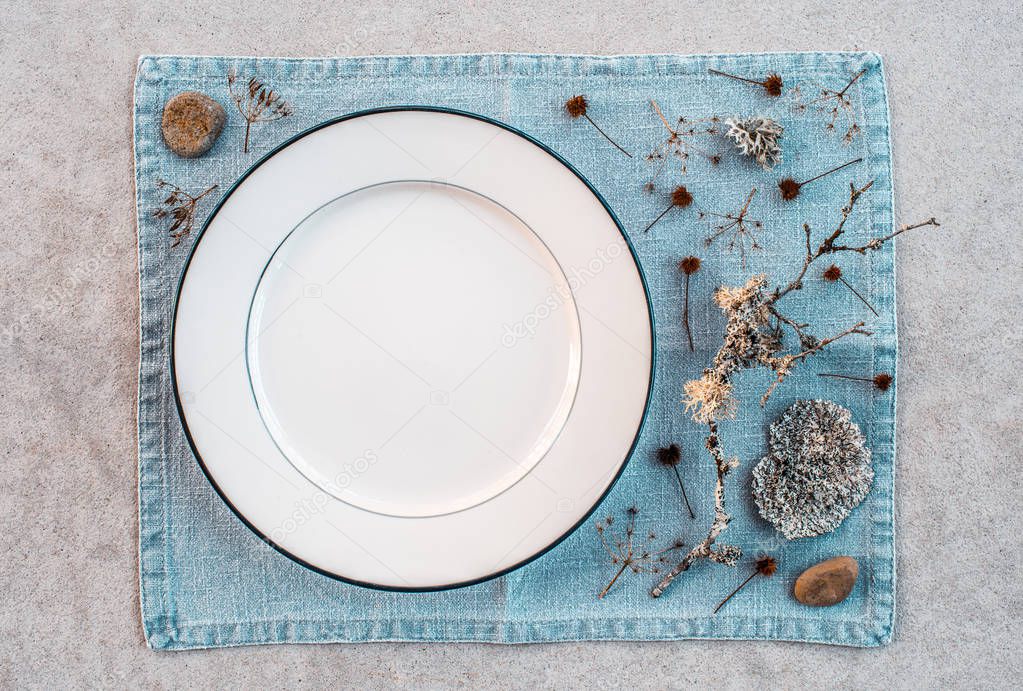 Table setting decorated with Scandinavian wild plants