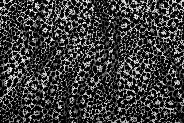 Silky black textile with silver animal skin print — Stock Photo, Image