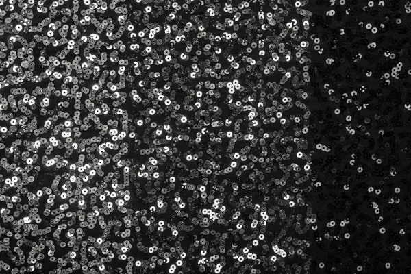 Stijlvolle zwarte textiel met glanzend zilveren pailletten — Stockfoto