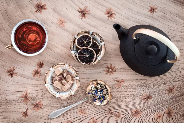 Floral tea and brown sugar — Stock Photo, Image