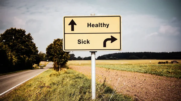 Ulica znak wobec zdrowy versus chory — Zdjęcie stockowe