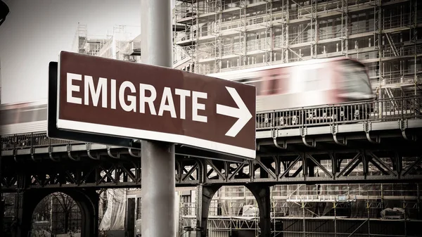 Street Sign to Emigrate — Stock Photo, Image