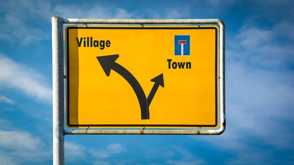 Street Sign to Village versus Town — Stock Photo, Image