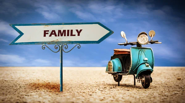 Straßenschild an Familie — Stockfoto