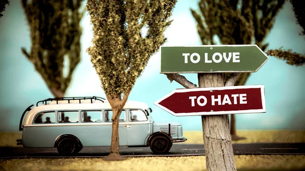 Street Sign TO LOVE versus TO HATE — Stock Photo, Image