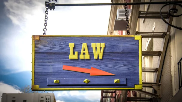 Уличный знак к закону — стоковое фото