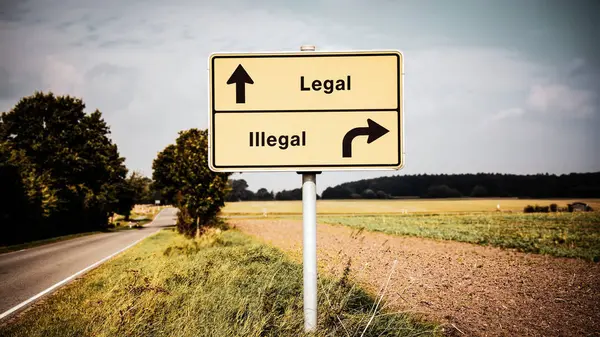 Straat teken legaal versus illegaal — Stockfoto