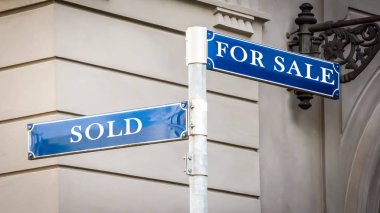 Sokak tabelası karşı Satılık sattı