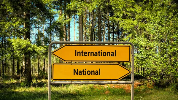 Street Sign nemzetközi kontra nemzeti — Stock Fotó