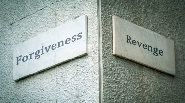 Street Sign the Direction Way to Forgiveness versus Revenge clipart