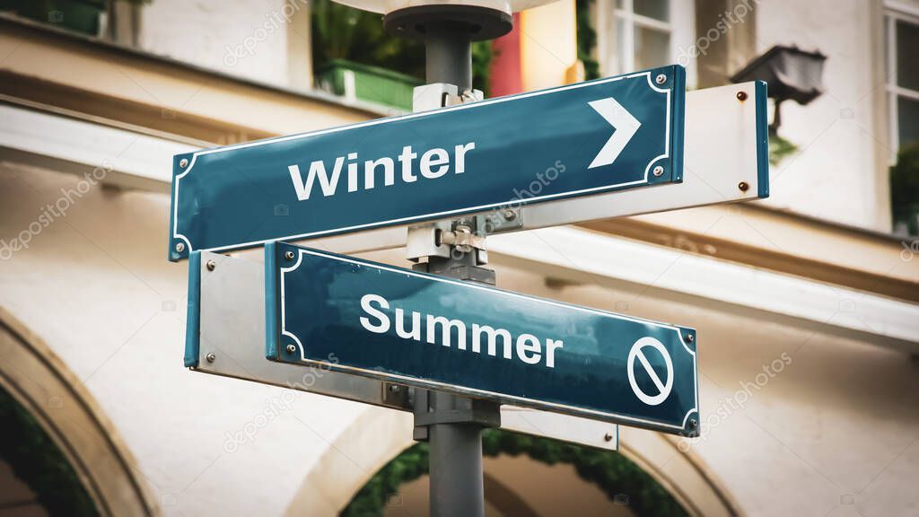 Street Sign the Direction Way to Winter versus Summer