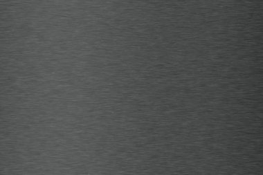 Karanlık metal doku fırça. Parlak metal doku arka plan ışık yansıması ile.