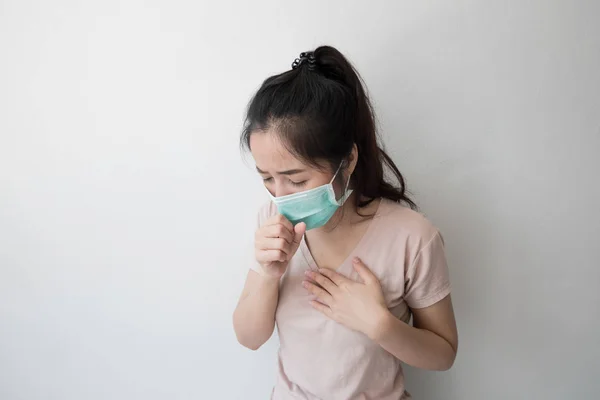 Asian women wear health masks to prevent germs and dust. Thoughts about health care