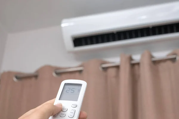 Focus ahead.Air condition control by using remote control and tu