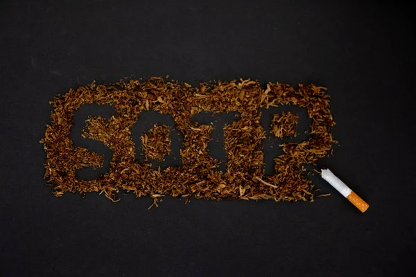 The word stop smoking on a black background,stop smoking.