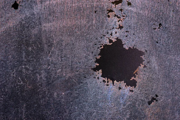 Paslı metal delik ve doku.