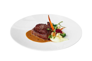 İzole Wagyu Striploin ile püresi Truffle sarımsak confit, mevsimlik sebzeler ve kırmızı şarap sosu.