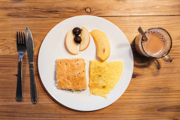 Top View Breakfast Menu Omelette Croissant Sandwich Banana Apple Grapes — Stock Photo, Image