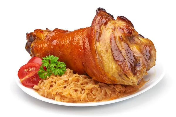 Kızarmış lahana turşulu domuz budu ve salata.