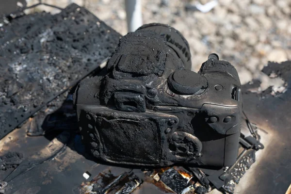 consequences of a fire. insurance case. Burnt, broken camera. insured property. non-warranty case