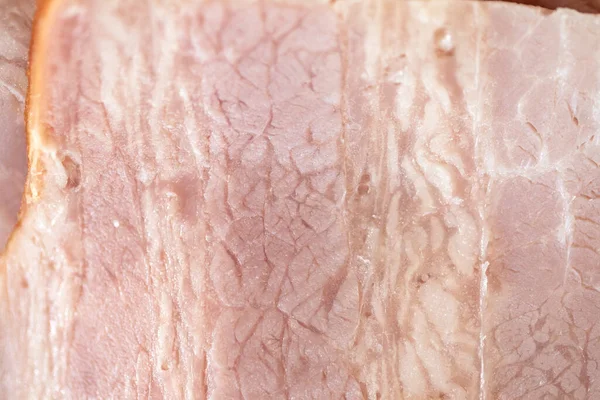 closeup meat textured for background. Slices of bacon or smoked pork meat.