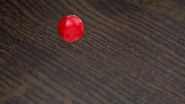 Een Rode Glas Bal Rolt Houten Oppervlak Ondiepe Scherptediepte Rendering — Stockvideo