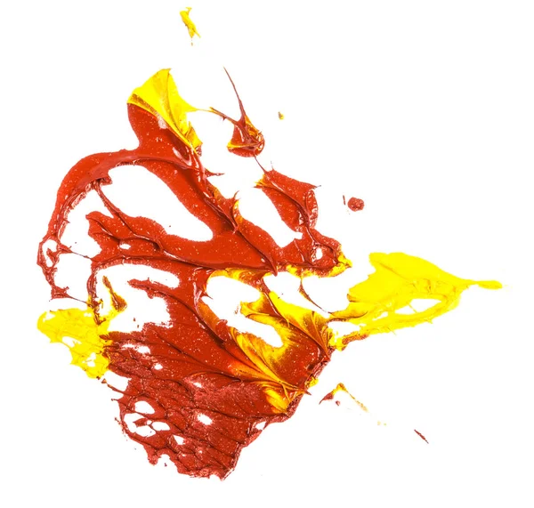 黄色和红色的油漆斑点。在白色背景上的涂片 — 图库照片