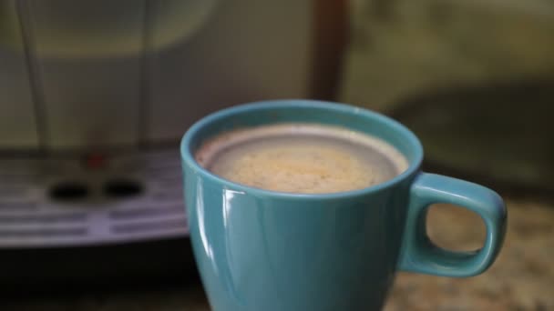 Frothy Invigorating Freshly Brewed Morning Coffee Spinning Blue Glass Close — Stock Video