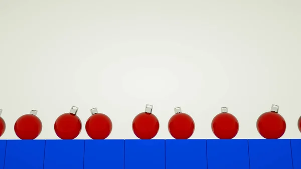 Bolas de Natal tridimensionais vermelhas em montanhas-russas azuis. Ano Novo — Fotografia de Stock