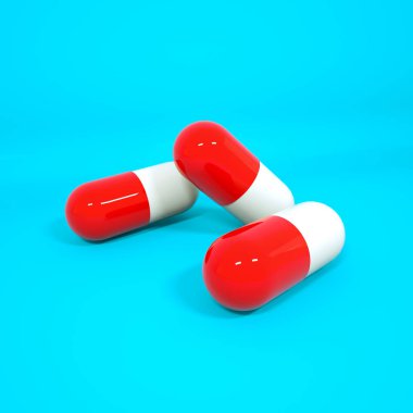 üzerinde kapsül şeklinde üç boyutlu kırmızı-beyaz tabletler