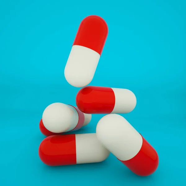 Comprimidos tridimensionales de color rojo-blanco en forma de cápsulas en un — Foto de Stock