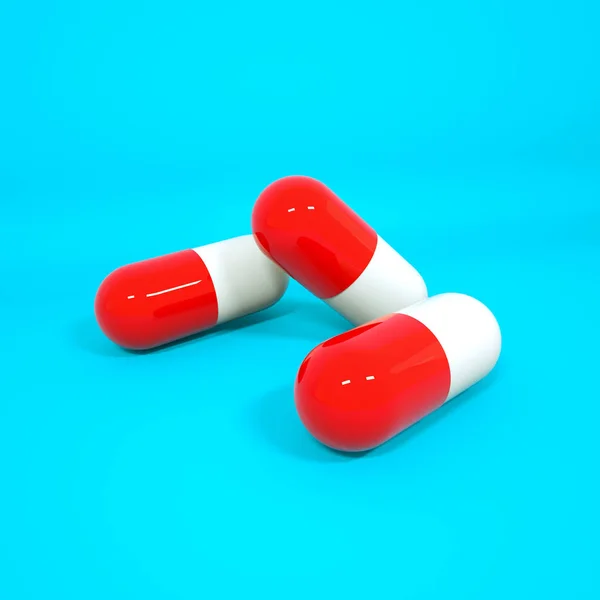 Tredimensionella röda vita tabletter i form av kapslar på en — Stockfoto