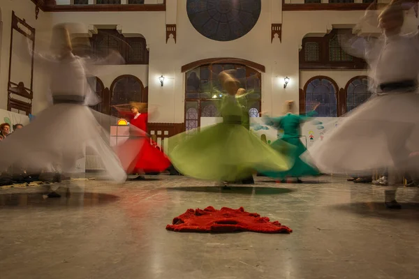 Whirling dervishes performing