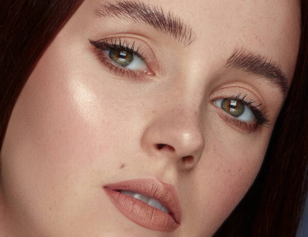 Beautiful portrait of a cute girl with freckles