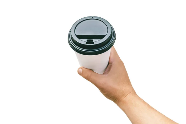 Isolerad takeaway Cup, för kaffe, te i en kille s hand med en svart mössa. på en vit bakgrund. — Stockfoto