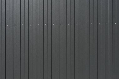 Yakın çekim dokusu. Metal levha profili, koyu gri